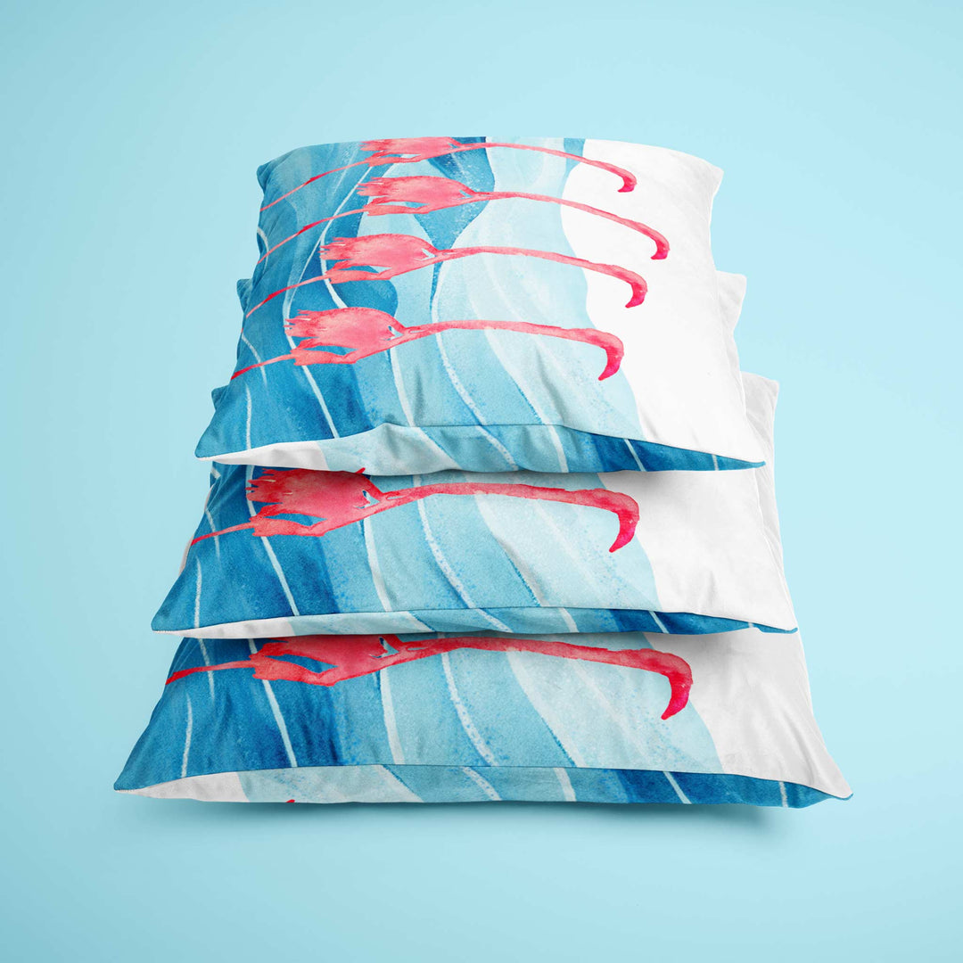 Stack of multiple flamingo pillows, showing available size options and cushion thickness for cozy, stylish home decor.