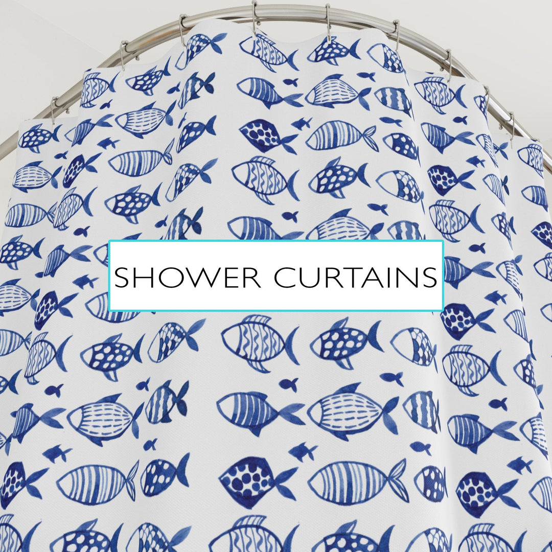 A bathroom featuring an ocean-themed shower curtain with a design of underwater sea life, including colorful fish and coral reefs, adding a vibrant coastal touch to the space.