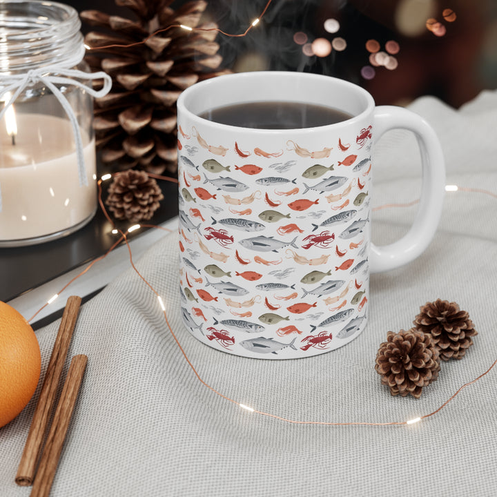 Coastal kitchen decor mug with detailed seafood illustrations