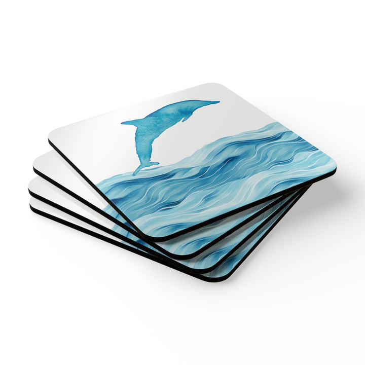 A stack of four dolphin-themed coasters, neatly arranged to display the smooth, high-gloss finish and black edges. Each coaster features the same ocean-inspired dolphin design.