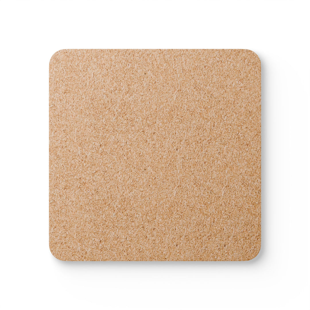 The back of a square coaster made of natural cork material, showcasing its eco-friendly, non-slip surface. The texture is visible, highlighting its durability and sustainability.