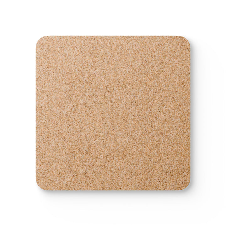 The back of a square coaster made of natural cork material, showcasing its eco-friendly, non-slip surface. The texture is visible, highlighting its durability and sustainability.