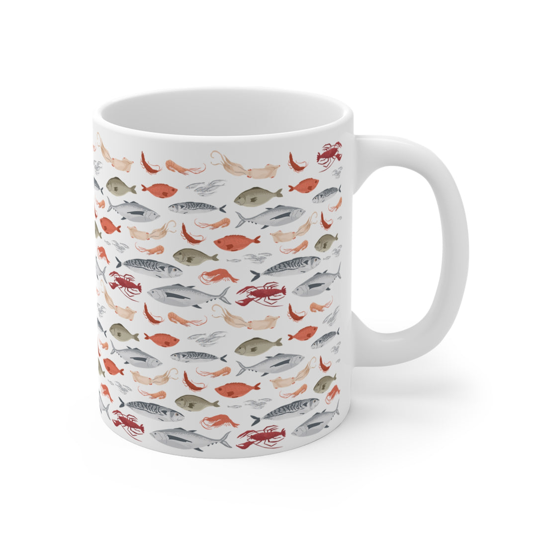 Ocean lover’s ceramic mug with nautical fish and shellfish pattern