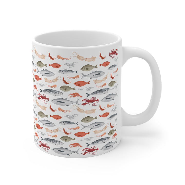 Ocean lover’s ceramic mug with nautical fish and shellfish pattern