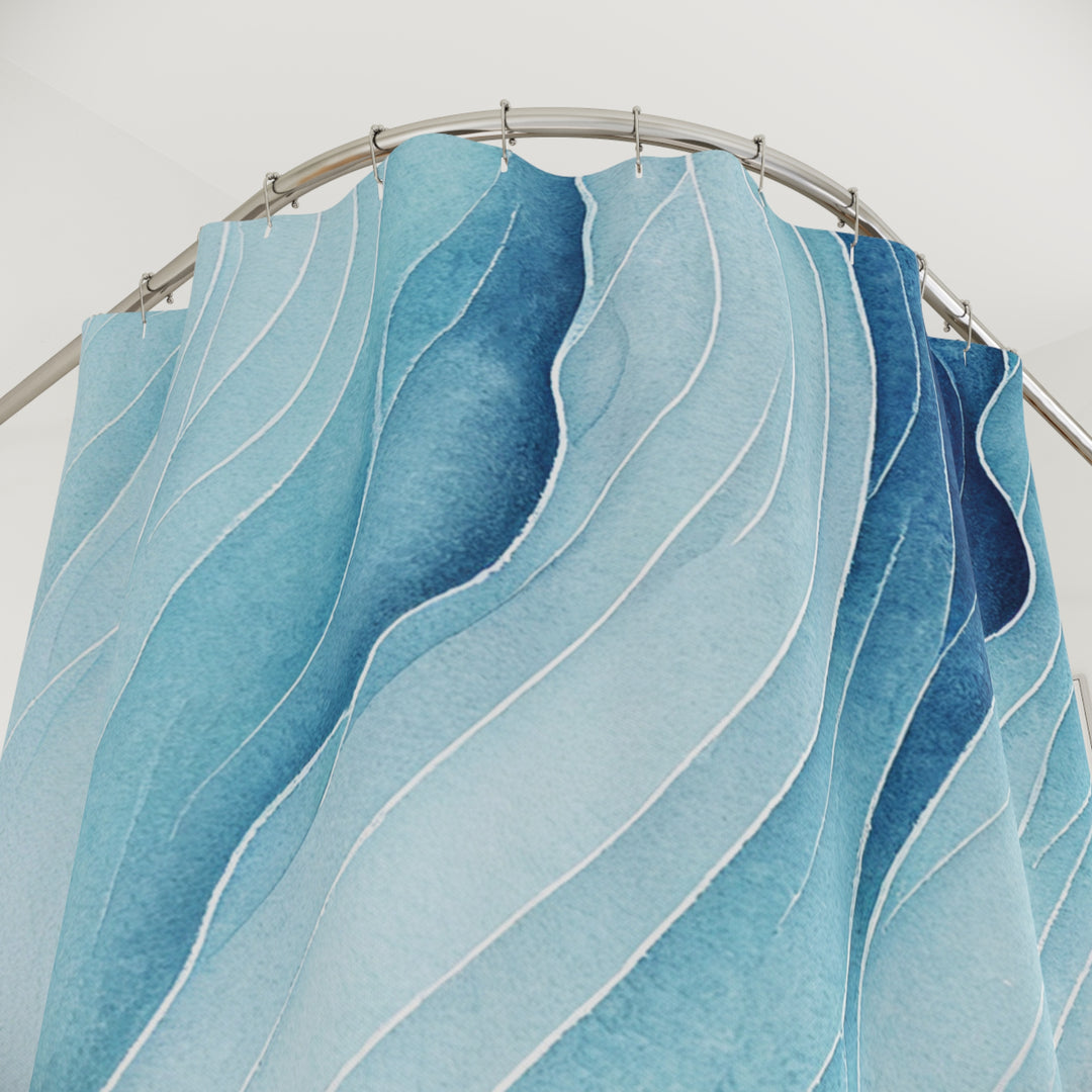 Close-up view of an abstract wave-pattern shower curtain in soft blue tones, showcasing intricate flowing lines and a calming gradient design.
